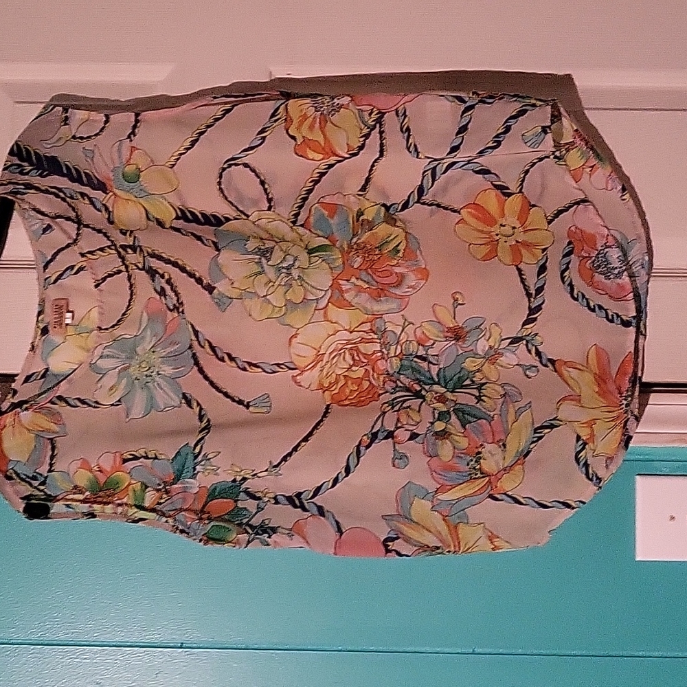 This colorful blouse is so pretty it's short sleeve kind of mesh but you can't